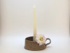 Thumbnail: Candle Holder 
Color: Oatmeal, Green, Blue
Size: 5” x 5” x 2” 
$25.00 each.